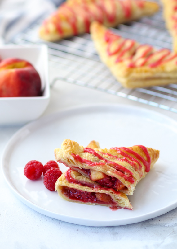 Raspberry Peach Turnovers with a Fresh Raspberry Glaze