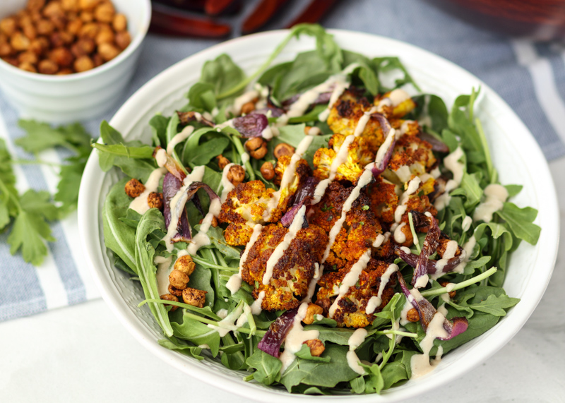 Fall Spinach and Arugula Salad with Turmeric Roasted Cauliflower, Crispy Chickpeas and Tahini Dressing  |  Lemon & Mocha